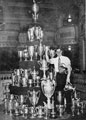 View: v03178 (Probably) Bernard Revitt with his swimming trophies, Sheffield Spartans Swimming Club