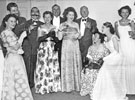 Wing Commander Ken A. Mummery, R.A.F. Norton (4th from right) and wife Sally (3rd right) and other dignitaries dressed for the Summer Ball mid 1950's