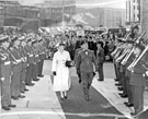 Wing Commander Ken A. Mummery, R.A.F Norton and wife Sally walk through a Guard of Honour in Sheffield mid 1950's