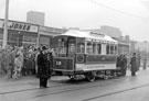 Horse drawn tram No. 15 (part of Christmas illumination attractions), outside No. 176, N. Jones, outfitters, The Moor
