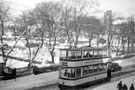 View: v03403 Tram No. 242 in the snow on Ecclesall Road South with All Saints Church in the background (between 1946-1954)