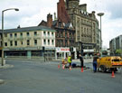 Leopold Street (left) and Fargate  showing No. 70, H.L Brown and Son Ltd.,  jewellers on the corner; Western Jean Company and No. 62/64, Joan Barrie Ltd., costumers