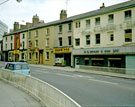 Leopold Street showing Nos. 57, Shampoo, uni sex hairdressers; 55, Three Tuns public house; 49, Leopold Bullion and H,. L. Brown and Son Ltd., jewellers, No. 70 Fargate