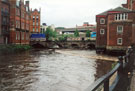 River Don at Lady's Bridge and weir the day after the flood with Royal Victoria Buildings (left) and Riverside Exchange Apartments (formerly Exchange Brewery) right