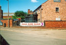 Sign on Alma Street showing Kelham Island Museum closed after flood water inundated the building during the flood of Monday 25th June
