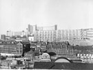 View: v03583 Elevated view looking across Pond Street bus station and former premises of George Senior and Sons, Ponds Forge (left); Joseph Rodgers and Sons Ltd., cutlery manufacturers, Sheaf Island Works towards Park Hill and Hyde Park Flats