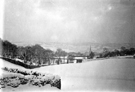 View towards Ranmoor and St John's Church from Manchester Road, showing the aqueduct in the snow