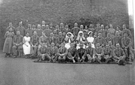 Group of medical staff and patients at Lydgate Hospital for wounded during World War 1 (housed in Lydgate Lane School)