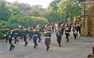 Charitable event at Endcliffe Hall in aid of the Army Benevolent Fund, unidentified military band 'beating the retreat'