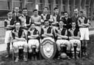 Colley School Football Team with shield, 1952