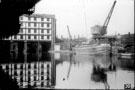Straddle Warehouse, Canal Basin with a Keel and Mobile Crane in the background