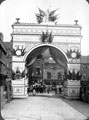 Queen Victoria's visit to Sheffield showing decorative arch at junction of Broad Street and South Street, Park, photographed from South Street looking towards Broad Street. Premises in background include Broad Street Cafe
