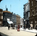 High Street from Fargate, prior to street-widening of 1896, premises on right, No. 4 J. Preston, chemist, No. 6 William Lewis, tobacconist, No. 8 White Bear Inn, premises in background include Nos. 9 -11 Sheffield Goldsmiths' Co and Castle Chambers