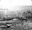 Sheffield Flood. Badly damaged Hill Bridge looking towards back to back houses and Freemasons Arms on Walkley Lane
