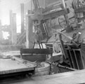 A twelve ton electric furnace ready for pouring steel into ladle, possibly Sanderson Kayser Ltd., Attercliffe Steel Works, Newhall Road