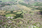 Aerial view of Hackenthorpe area. Prominent roads in foreground include Birley Spa Lane, Spring Water Drive and Spa View Road. Birley Spa Primary School, Jermyn Crescent, centre. Dyke Vale Road and Mosborough Parkway in background