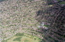 Aerial view of Shiregreen area. Prominent roads in foreground include Hartley Brook Road (including Hartley Brook School), Hartley Brook Avenue and Nether Shire Lane. Roads in centre of picture include Gregg House Road and Shirehall Road