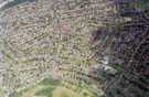 Aerial view of Shiregreen area. Prominent roads in foreground include Hartley Brook Road (including Hartley Brook School), Hartley Brook Avenue and Nether Shire Lane. Roads in centre of picture include Gregg House Road and Shirehall Road