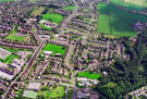 Aerial view of Stocksbridge area. Stocksbridge School, Shay House Lane, left. Alpine Road (including Stocksbridge Nursery and Infant School) and Linden Crescent, foreground. St. Ann's RC School, McIntyre Road, centre