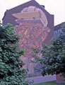 Steelworker, brick mural by Paul Waplington on the wall of No. 11 Castle Street from Snig Hill