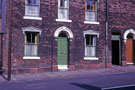 No. 23 and 25 (doorway right), Petre Street showing the ornate lintels