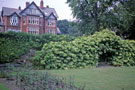 Grade II Listed Courting Arbour and Terrace,1905 by Edwin Lutyens, No. 98 Graham Road, originally in the grounds of Esholt House, No. 381 Fulwood Road the rear of which is in the background