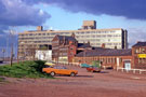  No. 36 Howard Street, P. Davy, heating engineer, No. 13 and Nos. 17-21, W. Gillott and Son, pearl cutters, Pearl Works, Eyre Lane (right) from Arundel Gate with Sheffield Polytechnic later Owen Building, Hallam University in the background