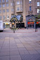 Entrance to Orchard Square from Fargate showing Etam, ladies fashions left and Dixons, photographic; audio visual shop