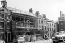 Nos. 20 - 14 Paradise Square, showing building works to No. 18 the former Middle Class School (Hebblethwaite's Academy), later became the AA
