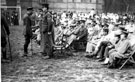 H.M. King George V addressing Corporal Wilfred Dolby Fuller (1893 - 1947), V.C., [Grenadier Guards] Sgt. Joseph. D.C.M. and SGT. Crookes. D.C.M., 3rd Northern General Base Hospital, Broomhall, World War I