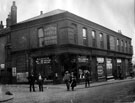 View: y00265 Exchange Street and corner of Castle Hill (left), 1913-1914, No. 15 Exchange Street, William Anson, umbrella manufacturer; No. 17 Maurice Argyle Heathcote, grocer and No. 23 Sheffield Cafe Co. Ltd., Norfolk Castle Dining Rooms