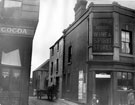 Exchange Street and corner of Castle Folds Lane, 1913-1914, No. 23 Exchange Street, Sheffield Cafe Co. Ltd., Norfolk Castle Dining Rooms (left) and No. 27 Rotherham House public house (right)
