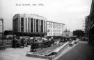 View: y00503 High Street looking towards Market Place and shell of former Burton Montague (nineteen years after Blitz), Nos. 59 - 65 C and A Modes Ltd., right