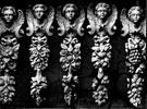 Carvings by Arthur Hayball.  All six cherubs are different, as are the carved fruit, flower and leaf motifs