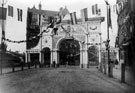 View: y00608 Pinstone Street showing decorations for Queen Victoria's visit to officially open the Town Hall