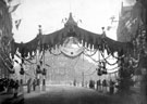 View: y00635 High Street looking towards Cole's Corner showing decorations for Queen Victoria's visit