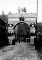 Decorative arch to celebrate the royal visit of Queen Victoria, on junction of Broad Street and South Street, Park, photographed from South Street looking towards Broad Street, premises in background include Broad Street Cafe