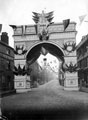 Decorative arch to celebrate the royal visit of Queen Victoria, on junction of Broad Street and South Street, Park,  photographed from Broad Street looking towards South Street, premises include No 1, Industry Inn, left