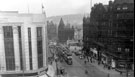 View: y00741 Elevated view of High Street looking towards Commercial Street, Nos. 51 - 55 Burton Montague Ltd., tailors, left, Nos. 80 - 84 Alexandre Ltd., tailors, King's Head Hotel and Marples Hotel, right