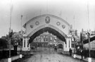 Decorative arch for the royal visit of Prince and Princess of Wales, Victoria Station Road looking towards Exchange Street
