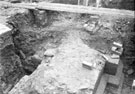 View: y00899 Sheffield Castle excavations recorded by J.B. Himsworth. Ruins of Courtyard buildings (walls and plinth), uncovered on Market Site