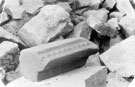 View: y00918 Sheffield Castle excavations recorded by J.B. Himsworth. Piece of dog tooth moulding, beautifully worked in coarse yellow sandstone