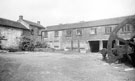 Warehouse and rear of stables, Abbeydale Works, former premises of W. Tyzack, Sons and Turner Ltd., manufacturers of files, saws, scythes etc., prior to restoration and becoming Abbeydale Industrial Hamlet Museum, Jessopp's Tilt Hammers, right