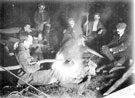 Round the camp fire at Masson. Group includes James W. Puttrell, the famous cragsman and cave explorer