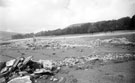 Ruins of Derwent Hall, submerged under Ladybower Reservoir, revealed by the drought of 1949