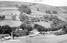 Ladybower Reservoir and ruins of St. James and St. John's Church, Derwent. Vicarage in background