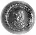 Plaque, dated 1918, depicting William Ripper, Professor of Engineering 1889-1923 and founder of the National Trades Technic Society