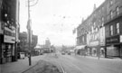 Moorhead looking towards The Moor from Pinstone Street. Premises include Jay's Furnishing Stores, house furnishers and No. 2 W.A. Broom Ltd., bakers