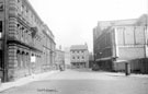 Hartshead, Nos 5 (Hartshead Chambers) and 7 (Montgomery Chambers), left, and rear of Telegraph  Offices, right. Dove and Rainbow public house, in background