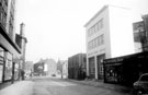Cemetery Road, Sharrow looking towards The Moor, including old and new Barclays Bank Ltd., No 3, Bernard Benson, Hosiery Specialist, on right and Sheffield and Ecclesall Co-operative Society (The Arcade), on left